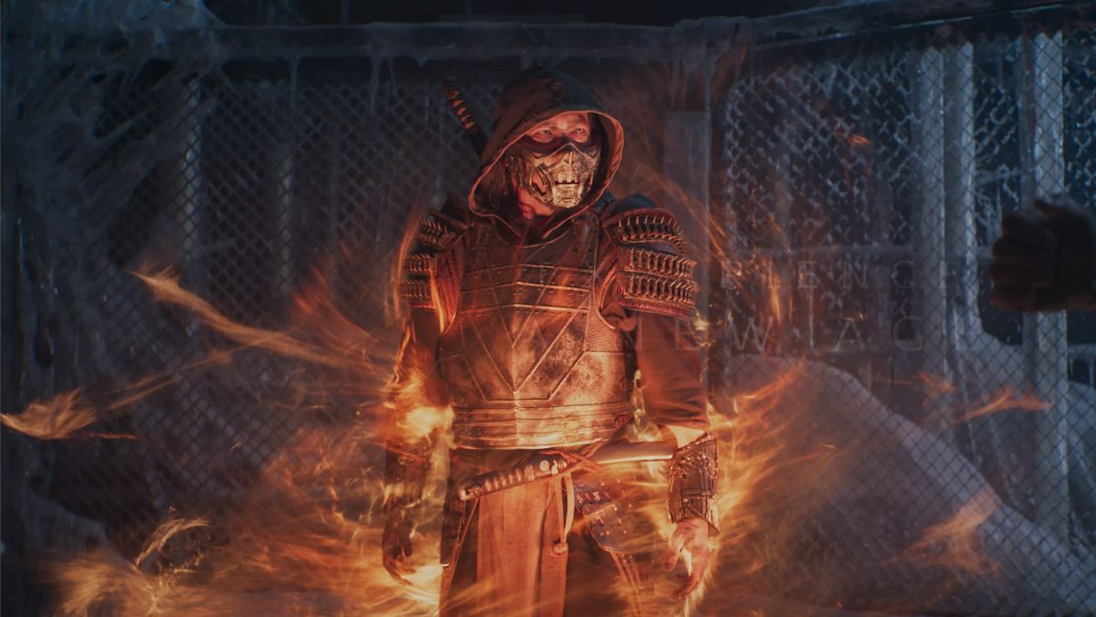 A cool scene from Mortal Kombat 2021 where fire surronds the main character - Mortal Kombat 2 is on its way