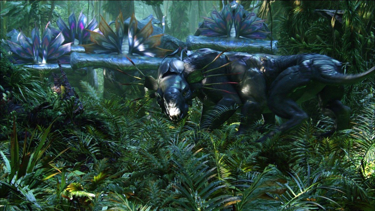 A cat-like animal and rhino-like animals from the movie Avatar