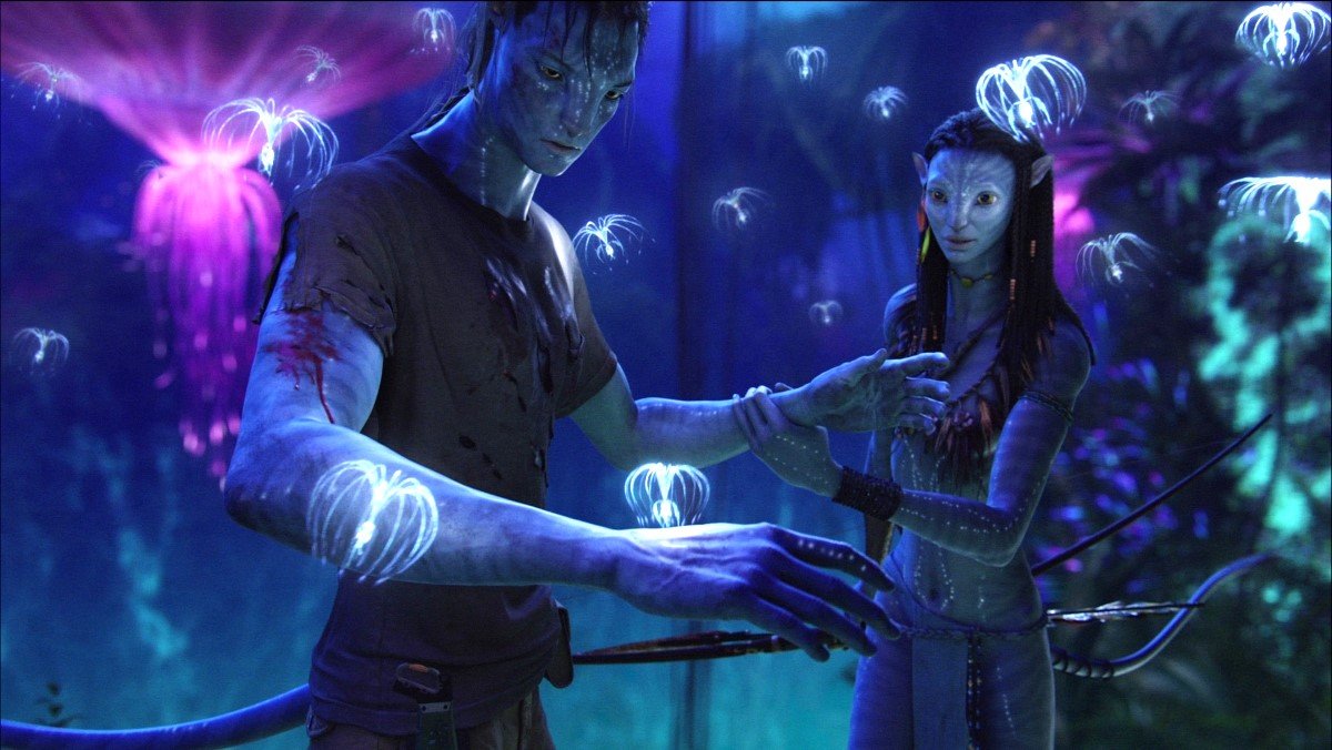 Two Na'vi with bioluminescent plants and creatures in Avatar