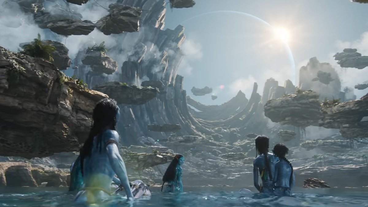 Several Na'vi look on in awe of a gorgeous and seemingly impossible vista on Pandora in Avatar: The Way of Water.