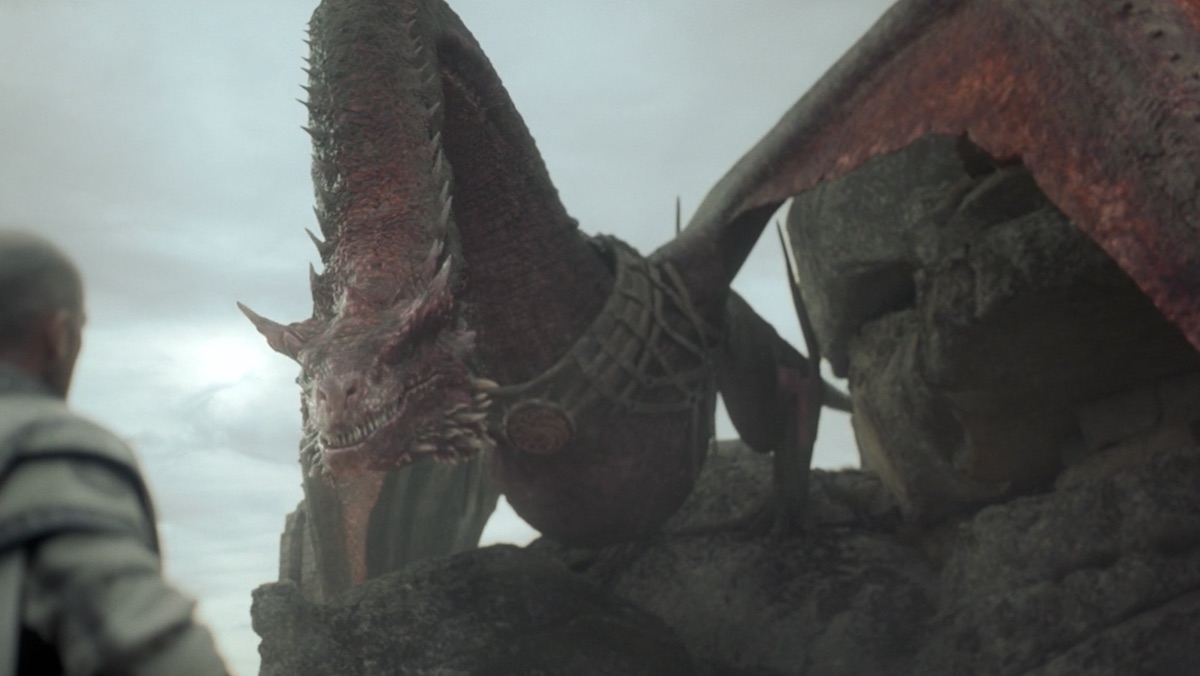 Caraxes stands menacing two potential members of Queen Rhaenyra's Queensguard at Dragonstone on House of the Dragon