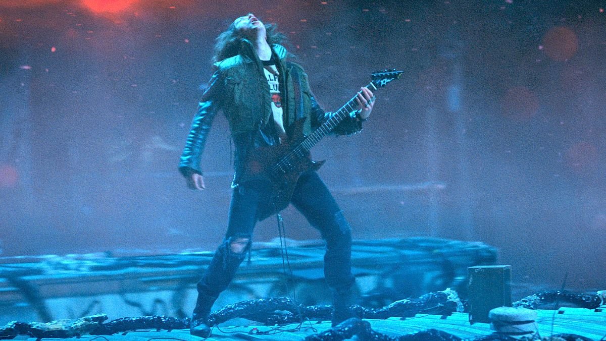 Eddie Munson playing his guitar in stranger things 4. Ticketmaster will show ticket cost upfront, cannot have hidden fees any longer