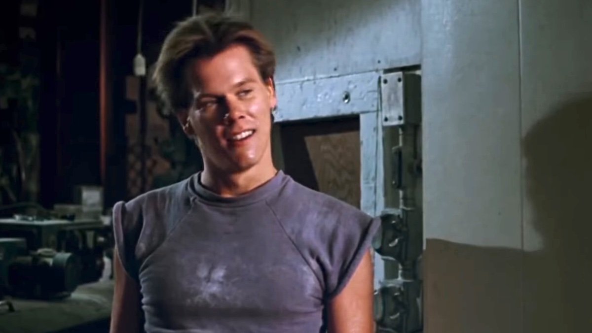 Kevin Bacon in a t-shirt as Ren in Footloose