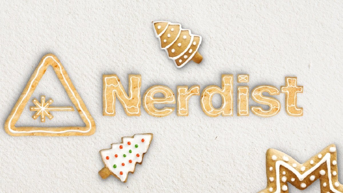 The Nerdist logo and name in gingerbresd surrounded by gingerbread cookies in the shape of trees