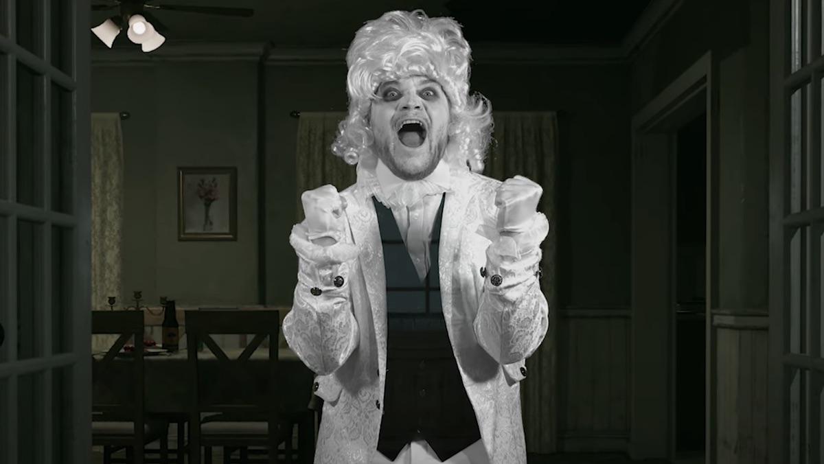 Nick Lutsko dressed as a 19th century ghost in all white from his video for A Ghost Story
