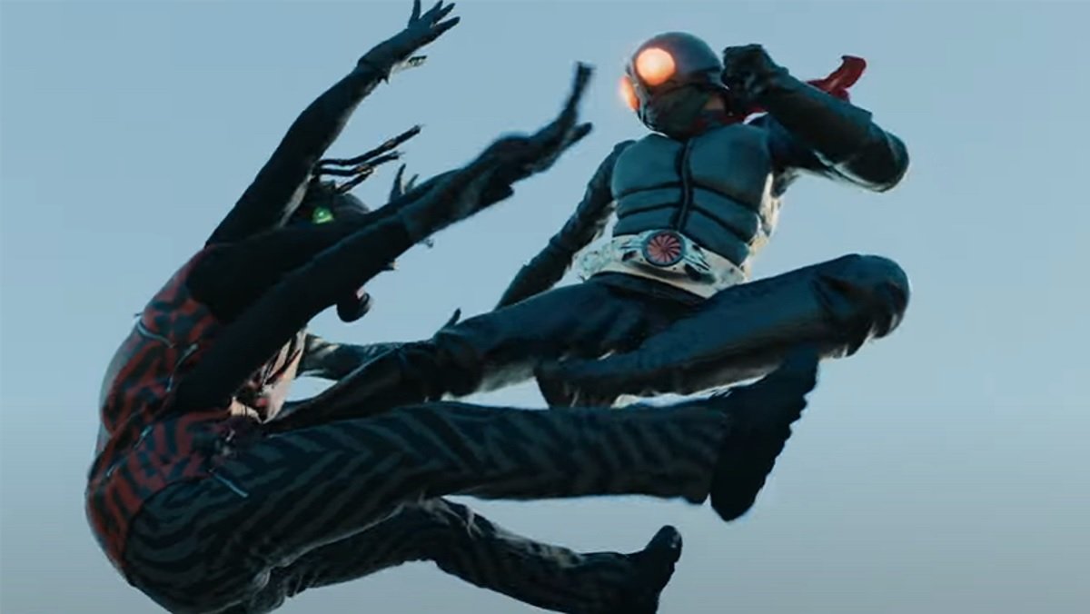 Shin Kamen Rider's titular lead kicks a spider-themed baddie.