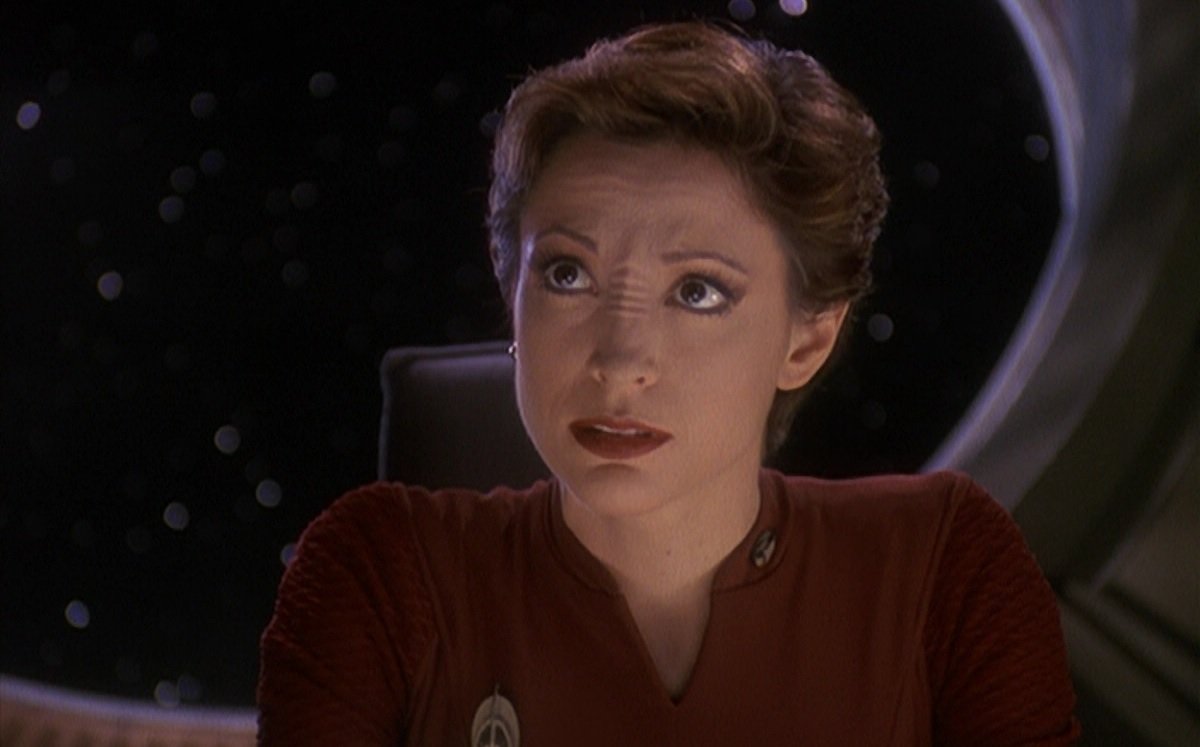 Major Kira Nerys (Nana Visitor) makes a passionate point in Star Trek: Deep Space Nine.