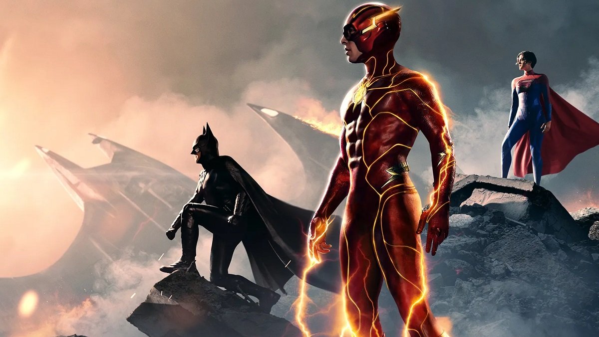 The poster for The Flash, featuring Ezra Miller as Barry Allen, Michael Keaton as Batman, and Sasha Calle as Supergirl. 